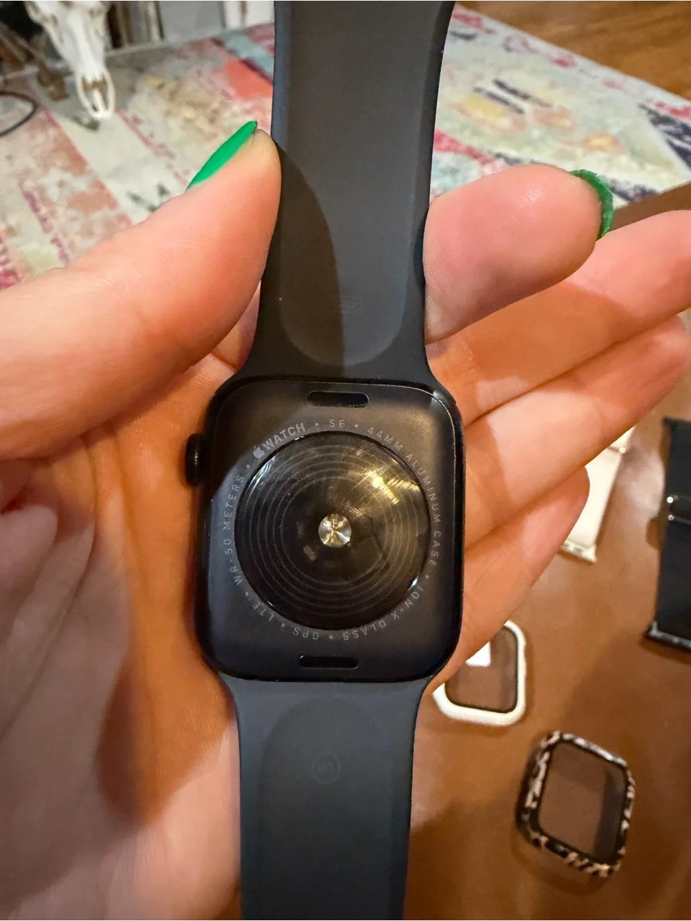 Apple Smartwatch Bundle with Black Watch and Multiple Colored Straps